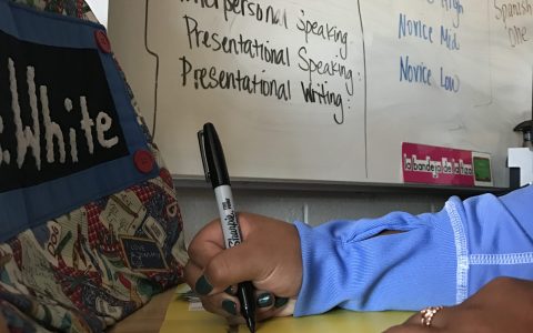 Student updates her proficiency folder